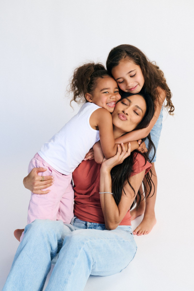 shay mitchell and kids in a campaign image for rini skin care